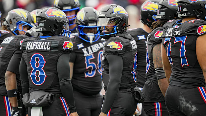 Nov 28, 2025; Lawrence, Kansas, USA; Kansas Jayhawks quarterback Jalon Daniels (6) looks to the sidelines during the second half against the Utah Utes at David Booth Kansas Memorial Stadium. Mandatory Credit: Jay Biggerstaff-Imagn Images Nov 28, 2025; Lawrence, Kansas, USA; Kansas Jayhawks quarterback Jalon Daniels (6) looks to the sidelines during the second half against the Utah Utes at David Booth Kansas Memorial Stadium. Mandatory Credit: Jay Biggerstaff-Imagn Images
