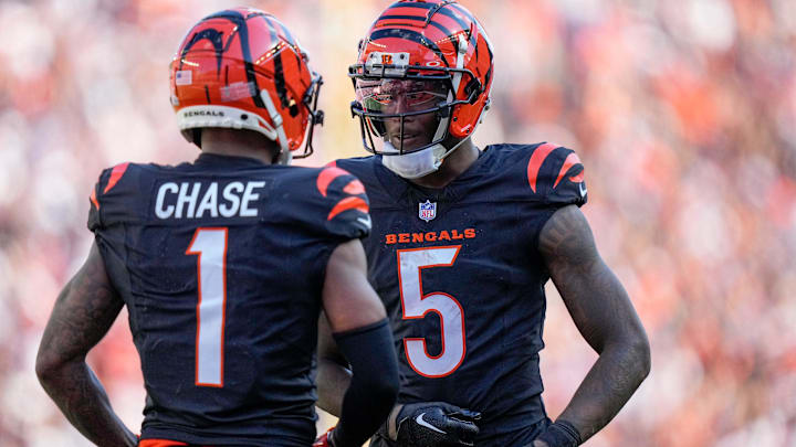 Cincinnati Bengals wide receiver Ja'Marr Chase (1) and Tee Higgins (5) celebrate the Chase touchdown in the fourth quarter of the NFL Week 5 game between the Cincinnati Bengals and Baltimore Ravens at Paycor Stadium in downtown Cincinnati on Sunday, Oct. 6, 2024. The Bengals fell to 1-4 on the season with a 41-38 loss to the Ravens.