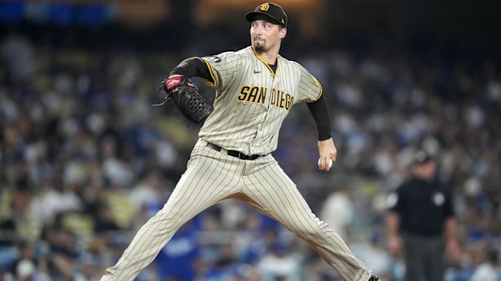 San Diego Padres starting pitcher Rich Hill (41) throws in the sixth inning against the Los Angeles Dodgers at Dodger Stadium in Los Angeles on Sept. 13, 2023. 