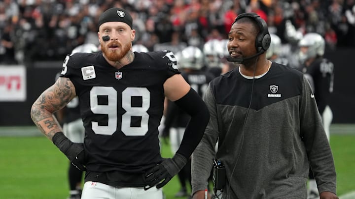 Jan 7, 2023; Paradise, Nevada, USA; Las Vegas Raiders defensive end Maxx Crosby (98) and defensive coordinator Patrick Graham talk during their game against the Kansas City Chiefs in the first half at Allegiant Stadium. Mandatory Credit: Kirby Lee-Imagn Images