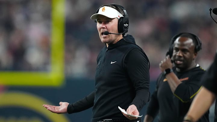 Dec 27, 2024; Las Vegas, NV, USA; Southern California Trojans head coach Lincoln Riley reacts against the Texas A&M Aggies in the first half at Allegiant Stadium. Mandatory Credit: Kirby Lee-Imagn Images Dec 27, 2024; Las Vegas, NV, USA; Southern California Trojans head coach Lincoln Riley reacts against the Texas A&M Aggies in the first half at Allegiant Stadium. Mandatory Credit: Kirby Lee-Imagn Images