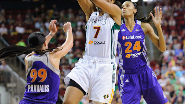 Aug 16, 2012; Seattle, WA, USA; Seattle Storm forward Tina Thompson (7) shoots a jump shot over the top of Phoenix Mercury guard Samantha Prahalis (99) during the 1st half at KeyArena. Seattle defeated Phoenix 72-58. Mandatory Credit: Steven Bisig-Imagn Images