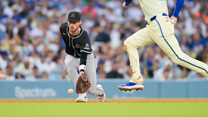 Aug 30, 2025; Los Angeles, California, USA; Los Angeles Dodgers first baseman Freddie Freeman (5) attempts to run past Arizona Diamondbacks shortstop Blaze Alexander (9) during the fourth inning against the Arizona Diamondbacks at Dodger Stadium. Mandatory Credit: Jayne Kamin-Oncea-Imagn Images Aug 30, 2025; Los Angeles, California, USA; Los Angeles Dodgers first baseman Freddie Freeman (5) attempts to run past Arizona Diamondbacks shortstop Blaze Alexander (9) during the fourth inning against the Arizona Diamondbacks at Dodger Stadium. Mandatory Credit: Jayne Kamin-Oncea-Imagn Images