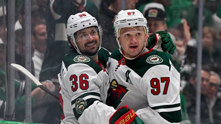 Apr 28, 2026; Dallas, Texas, USA; Minnesota Wild right wing Mats Zuccarello (36) and left wing Kirill Kaprizov (97) celebrates a goal scored by Zuccarello against the Dallas Stars in game five of the first round of the 2026 Stanley Cup Playoffs at American Airlines Center. Mandatory Credit: Jerome Miron-Imagn Images
