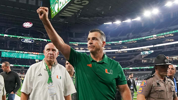 Dec 31, 2025; Arlington, TX, USA; Miami Hurricanes head coach Mario Cristobal leaves the field following the 2025 Cotton Bowl and quarterfinal game of the College Football Playoff against the Ohio State Buckeyes at AT&T Stadium. Mandatory Credit: Raymond Carlin III-Imagn Images