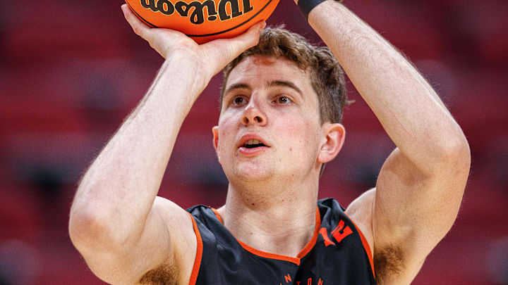 Princeton Tigers forward Caden Pierce (12) shoots the ball