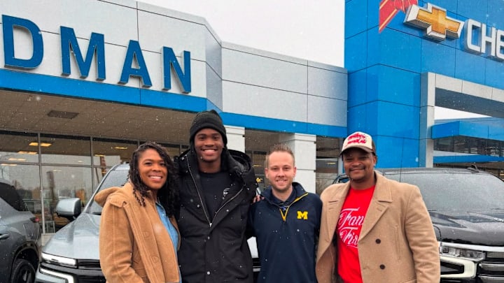 Michigan quarterback Bryce Underwood at Feldman Chevrolet of Highland as part of an NIL deal