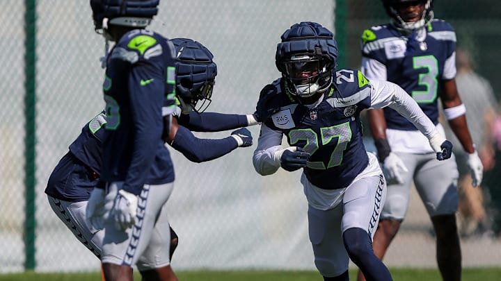 Seattle Seahawks cornerback Riq Woolen (27) runs through a drill during a joint practice with the Green Bay Packers on Thursday, August 21, 2025, at Clarke Hinkle Field in Ashwaubenon, Wis. Seattle Seahawks cornerback Riq Woolen (27) runs through a drill during a joint practice with the Green Bay Packers on Thursday, August 21, 2025, at Clarke Hinkle Field in Ashwaubenon, Wis.