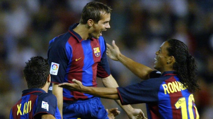  Philippe Cocu (C), Ronaldinho y Xavi