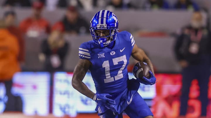 Nov 9, 2024; Salt Lake City, Utah, USA; Brigham Young Cougars wide receiver Keelan Marion (17) runs after a catch against the Utah Utes during the first quarter at Rice-Eccles Stadium. Mandatory Credit: Rob Gray-Imagn Images