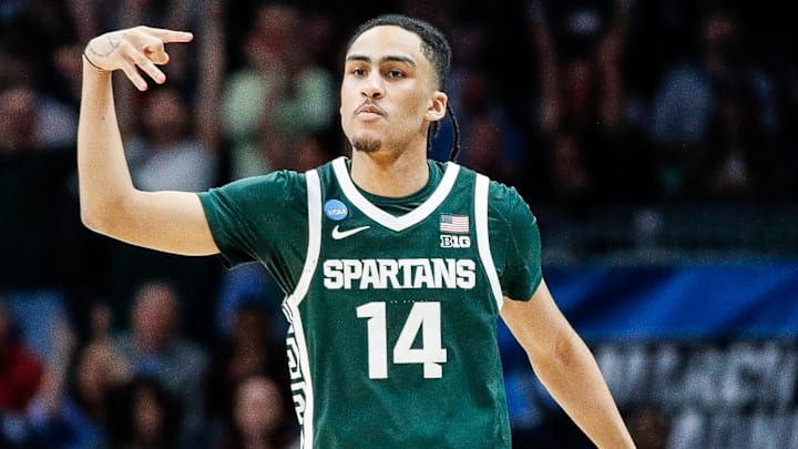 Michigan State guard Davis Smith (14) celebrates a three point basket against Mississippi State during the second half of NCAA tournament West Region first round at Spectrum Center in Charlotte, N.C. on Thursday, March 21, 2024.
