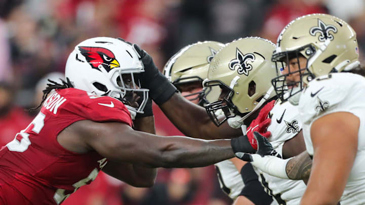 Arizona Cardinals defensive tackle Darius Robinson (56) rushes the line during a preseason game on Aug. 10, 2024 at State Farm Stadium in Glendale. Arizona Cardinals defensive tackle Darius Robinson (56) rushes the line during a preseason game on Aug. 10, 2024 at State Farm Stadium in Glendale.