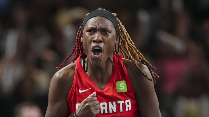 Sep 18, 2025; College Park, Georgia, USA; Atlanta Dream guard Rhyne Howard (10) reacts after making a late three point shot against the Indiana Fever during the second half during game three of round one for the 2025 WNBA Playoffs at Gateway Center Arena at College Park. Mandatory Credit: Dale Zanine-Imagn Images Sep 18, 2025; College Park, Georgia, USA; Atlanta Dream guard Rhyne Howard (10) reacts after making a late three point shot against the Indiana Fever during the second half during game three of round one for the 2025 WNBA Playoffs at Gateway Center Arena at College Park. Mandatory Credit: Dale Zanine-Imagn Images