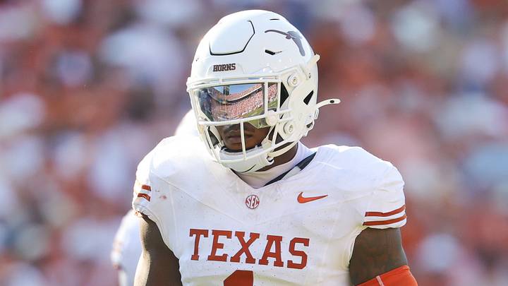 Texas Longhorns defensive end Colin Simmons (1) in action during the game against the Oklahoma Sooners at the Cotton Bowl. Texas Longhorns defensive end Colin Simmons (1) in action during the game against the Oklahoma Sooners at the Cotton Bowl.
