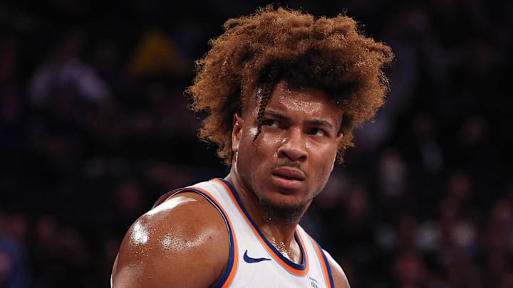 Jan 27, 2025; New York, New York, USA; New York Knicks guard Miles McBride (2) reacts after a basket during the second half against the Memphis Grizzlies at Madison Square Garden. Mandatory Credit: Vincent Carchietta-Imagn Images