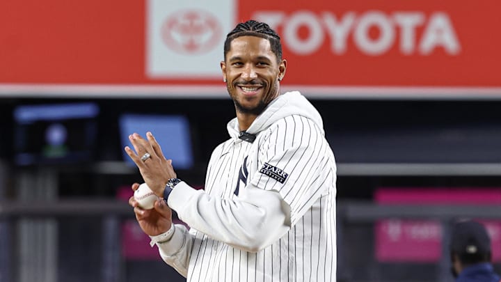 Sep 24, 2024; Bronx, New York, USA;  New York Knick guard Josh Hart throws out the first pitch before the game between the New York Yankees and the Baltimore Orioles at Yankee Stadium. Mandatory Credit: Vincent Carchietta-Imagn Images