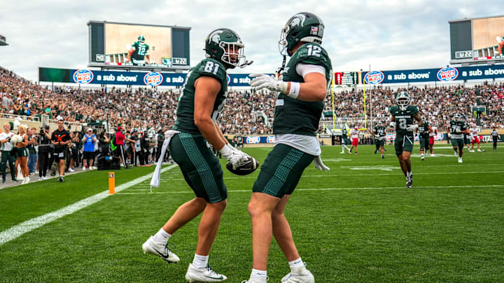 Michigan State's Michael Masunas, left, celebrates his touchdown catch with Jack Velling against Youngstown State during the third quarter on Saturday, Sept. 13, 2025, at Spartan Stadium in East Lansing.