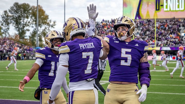Zach Durfee (5) slaps hands with cornerback Ephesians Prysock in the Illinois game. Zach Durfee (5) slaps hands with cornerback Ephesians Prysock in the Illinois game.