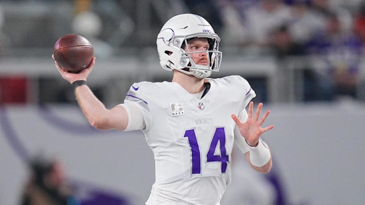 Dec 16, 2024; Minneapolis, Minnesota, USA; Minnesota Vikings quarterback Sam Darnold (14) passes the ball against the Chicago Bears in the fourth quarter at U.S. Bank Stadium. Mandatory Credit: Brad Rempel-Imagn Images Dec 16, 2024; Minneapolis, Minnesota, USA; Minnesota Vikings quarterback Sam Darnold (14) passes the ball against the Chicago Bears in the fourth quarter at U.S. Bank Stadium. Mandatory Credit: Brad Rempel-Imagn Images