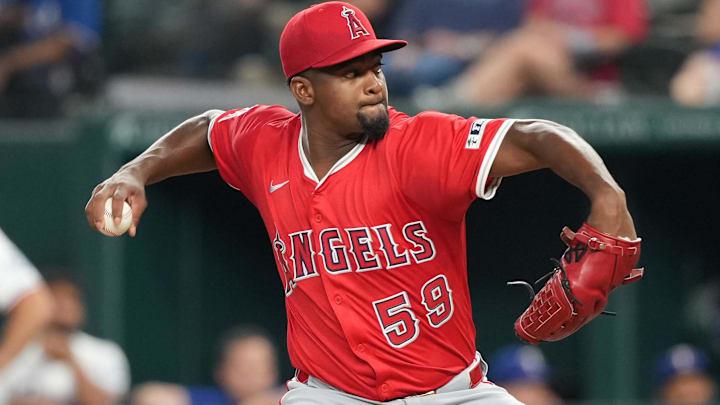 Aug 25, 2025; Arlington, Texas, USA; Los Angeles Angels starting pitcher Jose Soriano (59) delivers a pitch to the Texas Rangers during the third inning at Globe Life Field. Mandatory Credit: Jim Cowsert-Imagn Images