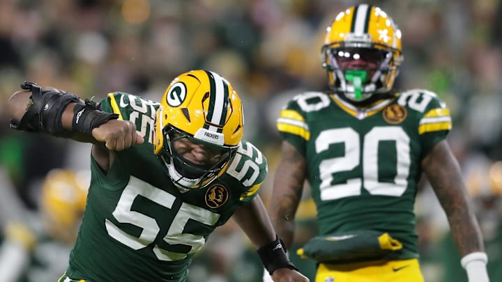 Nov 28, 2024; Green Bay, Wisconsin, USA; Green Bay Packers defensive end Kingsley Enagbare (55) celebrates after sacking Miami Dolphins quarterback Tua Tagovailoa (not pictured)  in the first half football game at Lambeau Field.  Mandatory Credit: Wm. Glasheen-Imagn Images