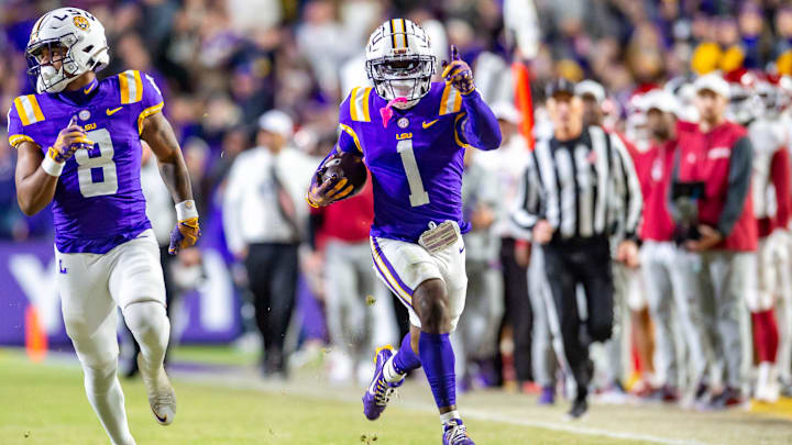 Aaron Anderson 1 scores a touchdown as the LSU Tigers take on the Oklahoma Sooners. Nov 30, 2024; Baton Rouge, Louisiana, USA; at Tiger Stadium. Aaron Anderson 1 scores a touchdown as the LSU Tigers take on the Oklahoma Sooners. Nov 30, 2024; Baton Rouge, Louisiana, USA; at Tiger Stadium.