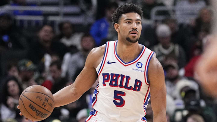 Dec 5, 2025; Milwaukee, Wisconsin, USA; Philadelphia 76ers guard Quentin Grimes (5) brings the ball up the court against Milwaukee Bucks in the second half at Fiserv Forum. Mandatory Credit: Michael McLoone-Imagn Images