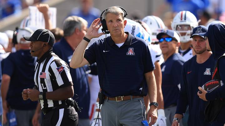 Sep 12, 2026; Provo, Utah, USA;  Arizona Wildcats head coach Brent Brennan looks on during the second half of a game against the BYU Cougars at LaVell Edwards Stadium.
