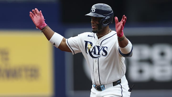 Apr 26, 2026; St. Petersburg, Florida, USA; Tampa Bay Rays designated hitter Yandy Díaz (2) reacts after hitting a two-run home run against the Minnesota Twins in the third inning at Tropicana Field. 