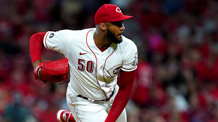 Cincinnati Reds relief pitcher Amir Garrett (50) follows through on delivery.