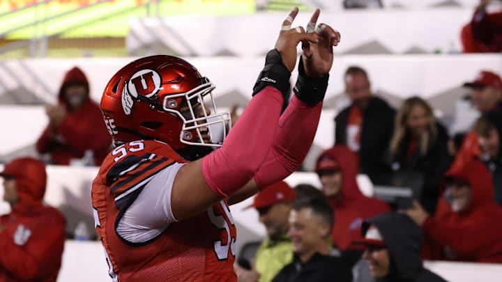 Utah Utes offensive lineman Spencer Fano (55) celebrates a touchdown against the Arizona State Sun Devils during the third quarter at Rice-Eccles Stadium. 