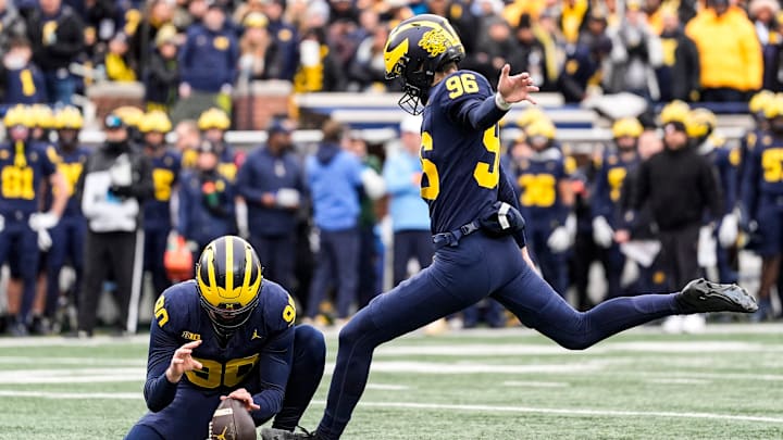 Michigan kicker Dominic Zvada (96) attempts a field goal against Ohio State during the first half at Michigan Stadium in Ann Arbor on Saturday, Nov. 29, 2025.
