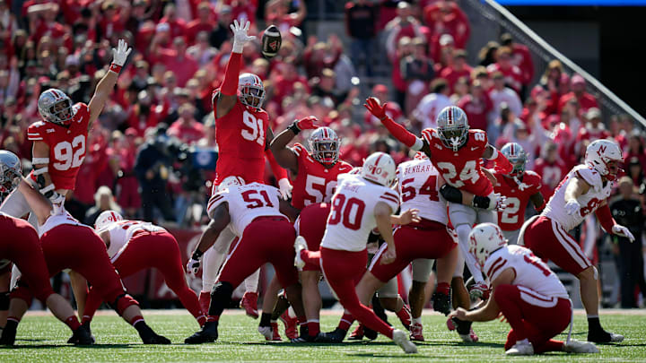 Nebraska placekicker John Hohl boots one of his three field goals against Ohio State Buckeyes in Columbus.