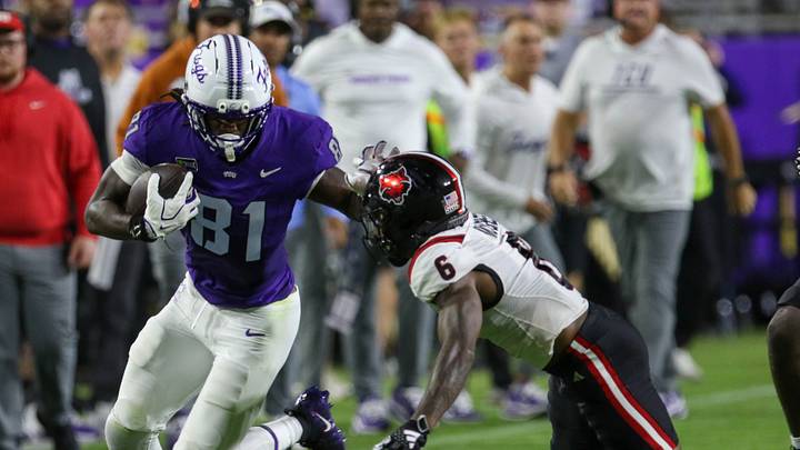TCU tight end Kari Ashley (81) carries the ball against Arkansas State at Amon G. Carter Stadium. TCU tight end Kari Ashley (81) carries the ball against Arkansas State at Amon G. Carter Stadium.