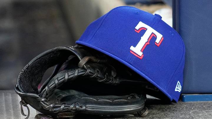 Jun 25, 2026; Toronto, Ontario, CAN; A Texas Rangers ball cap and glove lays in the dugout during a game against the Toronto Blue Jays at Rogers Centre. Mandatory Credit: John E. Sokolowski-Imagn Images Jun 25, 2026; Toronto, Ontario, CAN; A Texas Rangers ball cap and glove lays in the dugout during a game against the Toronto Blue Jays at Rogers Centre. Mandatory Credit: John E. Sokolowski-Imagn Images