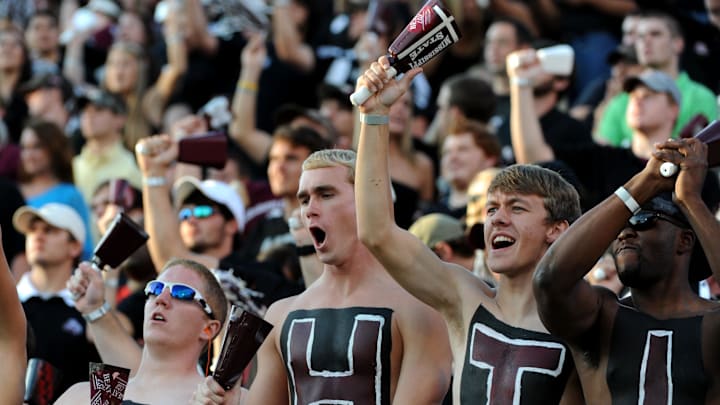 Sep 24, 2011;Starkville, MS, USA; Mississippi State Bulldogs students ring cowbells in celebration during their football game against the Louisiana Tech Bulldogs at Davis Wade Stadium. Mandatory Credit: Chuck Cook-Imagn Images