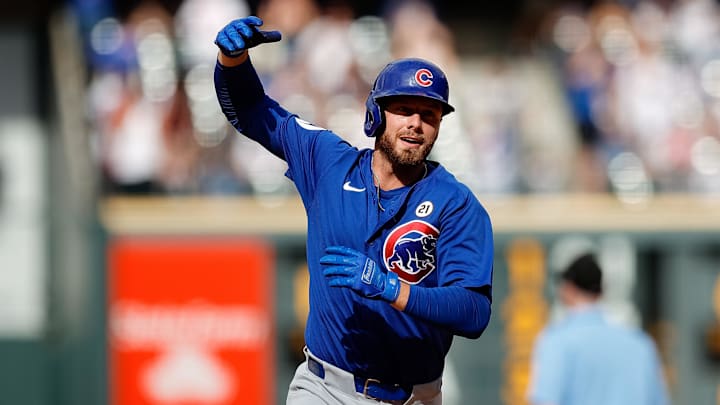 Sep 15, 2024; Denver, Colorado, USA; Chicago Cubs first baseman Michael Busch (29) gestures as he rounds the bases on a solo home run in the ninth inning against the Colorado Rockies at Coors Field.