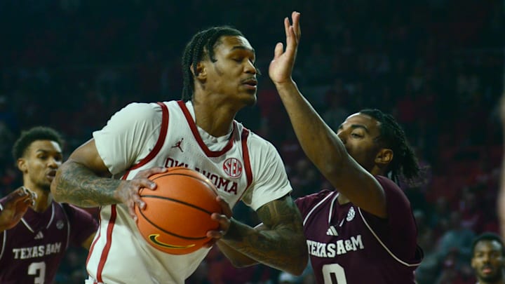 Oklahoma forward Tae Davis drives against Texas A&M. Oklahoma forward Tae Davis drives against Texas A&M.