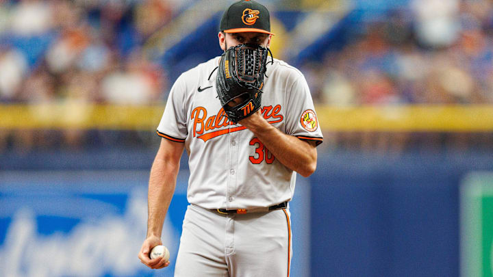 Jun 9, 2024; St. Petersburg, Florida, USA;  Baltimore Orioles pitcher Grayson Rodriguez (30) reacts after giving up a run against the Tampa Bay Rays in the sixth inning at Tropicana Field. Mandatory Credit: Nathan Ray Seebeck-Imagn Images