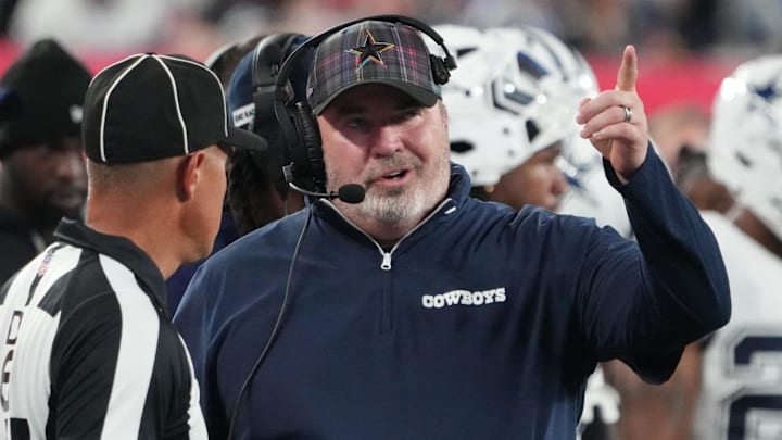 Sep 26, 2024; East Rutherford, New Jersey, USA;  Dallas Cowboys head coach Mike McCarthy speaks with a referee against the New York Giants at MetLife Stadium.