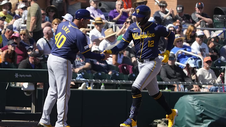 Mar 5, 2024; Scottsdale, Arizona, USA; Milwaukee Brewers first baseman Rhys Hoskins (12) celebrates