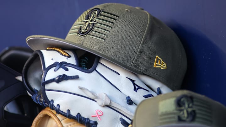 The Seattle Mariners Armed Forces day hat is pictured in the dugout before a game against the Atlanta Braves on May 20, 2023, at Truist Park.