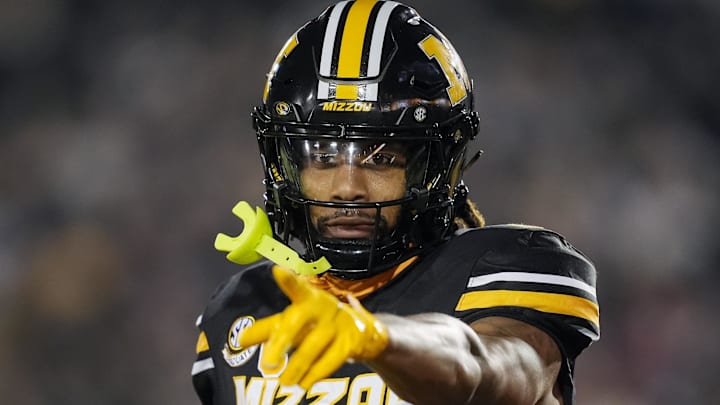 Nov 9, 2024; Columbia, Missouri, USA; Missouri Tigers wide receiver Theo Wease Jr. (1) celebrates after scoring a touchdown during the second half against the Oklahoma Sooners at Faurot Field at Memorial Stadium. Mandatory Credit: Jay Biggerstaff-Imagn Images Nov 9, 2024; Columbia, Missouri, USA; Missouri Tigers wide receiver Theo Wease Jr. (1) celebrates after scoring a touchdown during the second half against the Oklahoma Sooners at Faurot Field at Memorial Stadium. Mandatory Credit: Jay Biggerstaff-Imagn Images