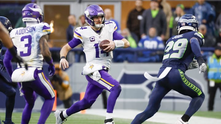 Minnesota Vikings quarterback Sam Darnold rushes against the Seattle Seahawks.