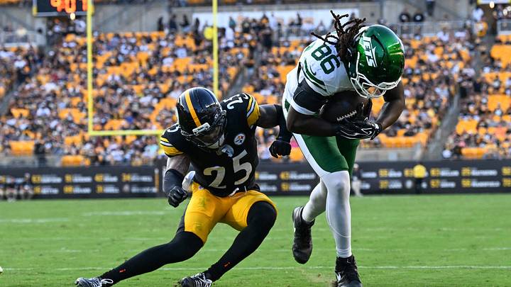 Aug 21, 2026; Pittsburgh, Pennsylvania, USA; New York Jets tight end Jelani Woods (86) scores a touchdown in front of Pittsburgh Steelers safety DeShon Elliott (25) during the first quarter at Acrisure Stadium. Mandatory Credit: Barry Reeger-Imagn Images Aug 21, 2026; Pittsburgh, Pennsylvania, USA; New York Jets tight end Jelani Woods (86) scores a touchdown in front of Pittsburgh Steelers safety DeShon Elliott (25) during the first quarter at Acrisure Stadium. Mandatory Credit: Barry Reeger-Imagn Images
