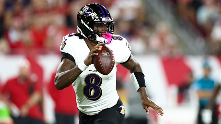 Baltimore Ravens quarterback Lamar Jackson (8) drops back to pass against the Tampa Bay Buccaneers in the second quarter at Raymond James Stadium. 