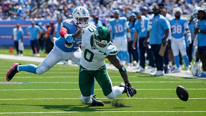 New York Jets running back Braelon Allen (0) can’t pull down the ball in front of Tennessee Titans linebacker Anthony Hill Jr. (53) during the second quarter at Nissan Stadium in Nashville, Tenn., Sunday, Sept. 13, 2026. New York Jets running back Braelon Allen (0) can’t pull down the ball in front of Tennessee Titans linebacker Anthony Hill Jr. (53) during the second quarter at Nissan Stadium in Nashville, Tenn., Sunday, Sept. 13, 2026.