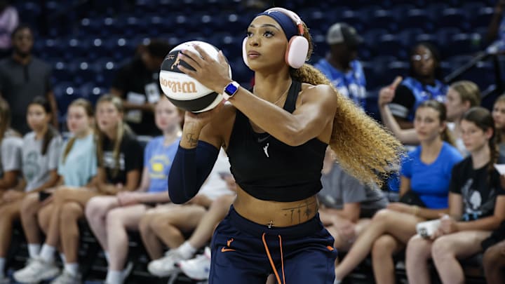 Connecticut Sun guard DiJonai Carrington (21) warms up before a basketball game against the Chicago Sky. Connecticut Sun guard DiJonai Carrington (21) warms up before a basketball game against the Chicago Sky.