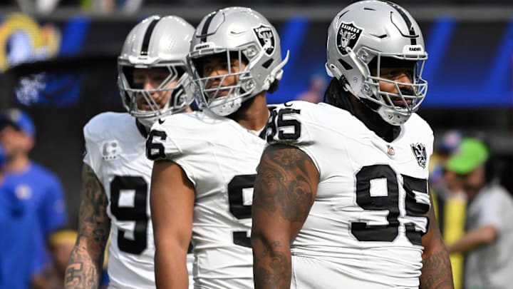 Oct 20, 2024; Inglewood, California, USA; Las Vegas Raiders defensive linemen Maxx Crosby (98), Jonah Laulu (96) and John Jenkins (95)  at SoFi Stadium. Mandatory Credit: Robert Hanashiro-Imagn Images