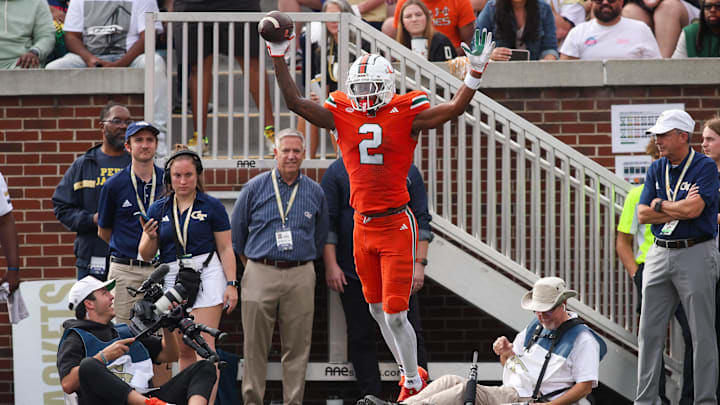 Nov 9, 2024; Atlanta, Georgia, USA; Miami Hurricanes wide receiver Isaiah Horton (2) celebrates after a touchdown catch against the Georgia Tech Yellow Jackets in the third quarter at Bobby Dodd Stadium at Hyundai Field. Mandatory Credit: Brett Davis-Imagn Images